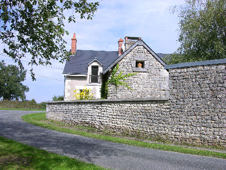 Walled front garden with bread oven view
